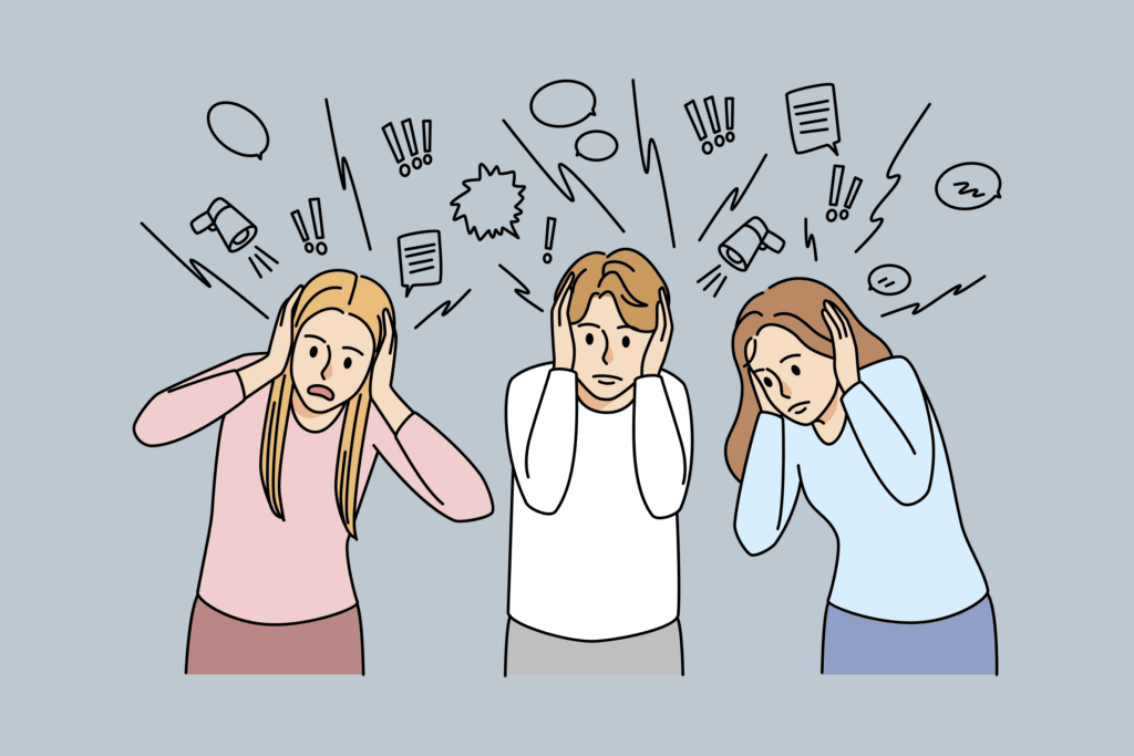 employees covering ears from noises and notifications, modern knowledge workers bombarded with notifications, how to regain focus and productivity